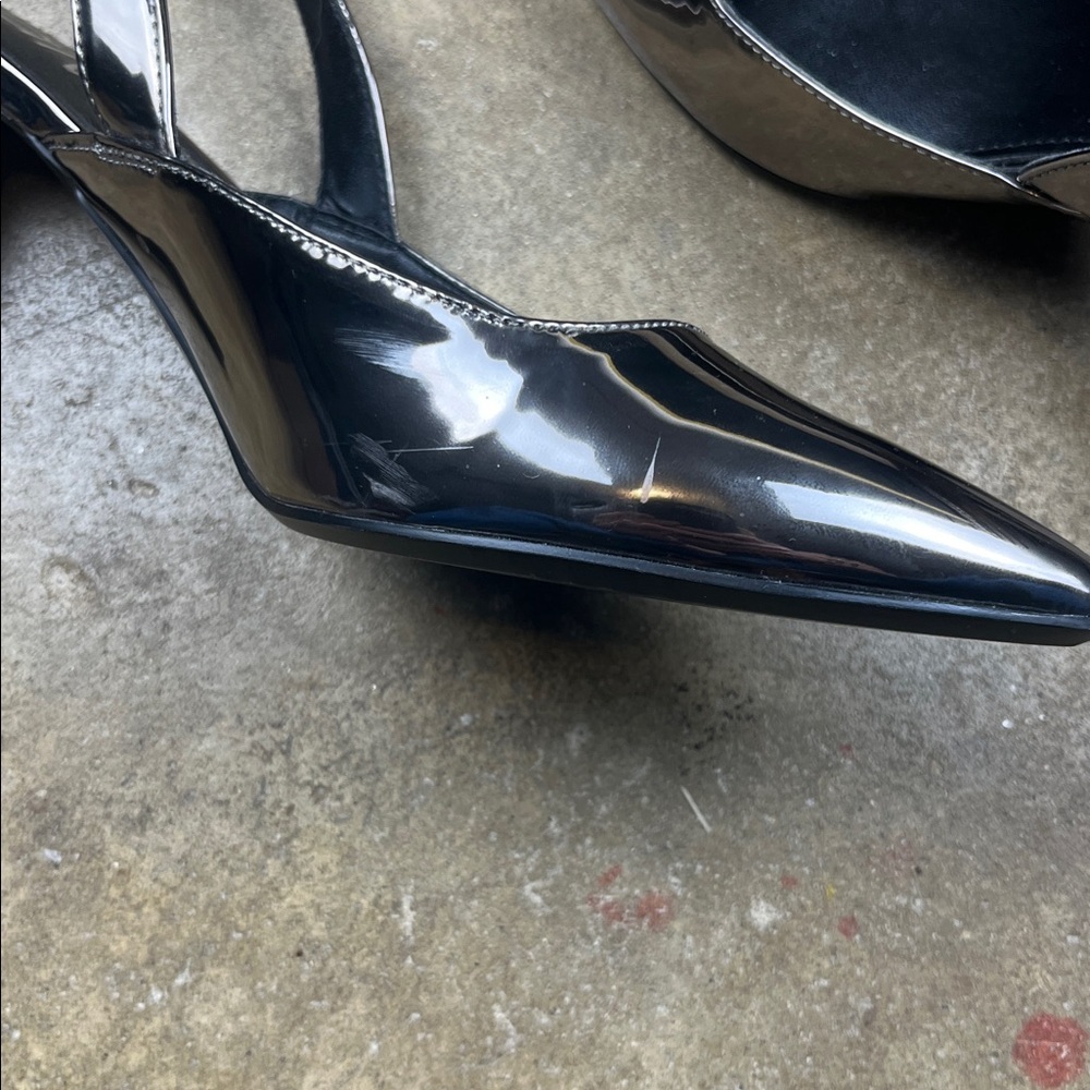 Calvin Klein Metallic Slingback Heels
Size: 9 - Picture 7 of 7